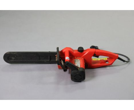 A Hecht electric-driven chainsaw (model no 2035).