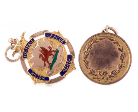R. THOMPSON, WELSH DIVISION 1 GOLD MEDAL 1923/4 the reverse inscribed WINNERS DIV:1 1923-24, in nine carat gold, along with h