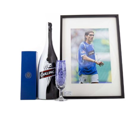 PEDRO MENDES OF RANGERS F.C., CARLING MAN OF THE MATCH MAGNUM OF CHAMPAGNE V. CELTIC  31ST AUGUST 2008 the botlle with Carlin