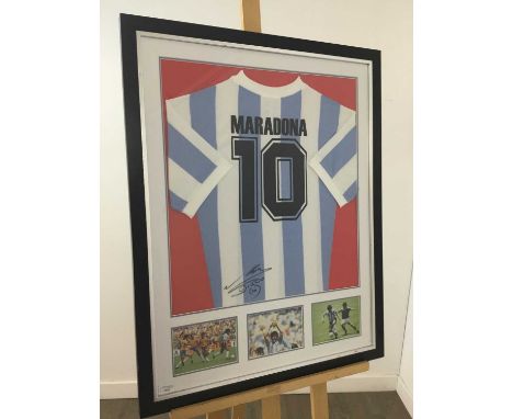 DIEGO MARADONA SIGNED ARGENTINA FOOTBALL SHIRT mounted with photos, framed and under glassNote: Whilst McTear's has no reason