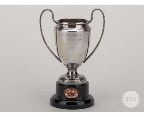 White-metal miniature European Cup inscribed European Champions Clubs Cup, the base with enamel badge inscribed Manchester Un