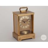 Viv Anderson a brass commemorative carriage clock with circular dial and Roman numerals