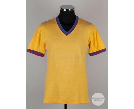 Cornel Dinu yellow, blue and red No.5 Romania v. Peru short-sleeved shirt, 1970, with v-neck collarIn the match played on 9th