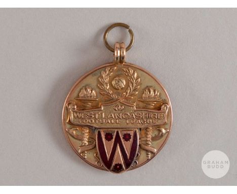 9ct gold and enamel West Lancashire Football League medal, the obverse inscribed WEST LANCASHIRE FOOTBALL LEAGUE, the reverse