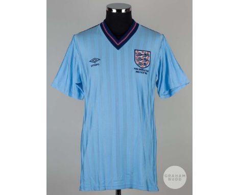 Viv Anderson rare sky-blue No.12 England 1986 World Cup match issued short-sleeved shirt, Mens, with v-neck collar and embroi
