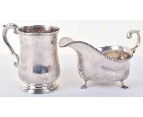 An early 20th century Georgian style silver sauce boat, by Harrison Brothers &amp; Howson, Sheffield 1923, acanthus leaf hand