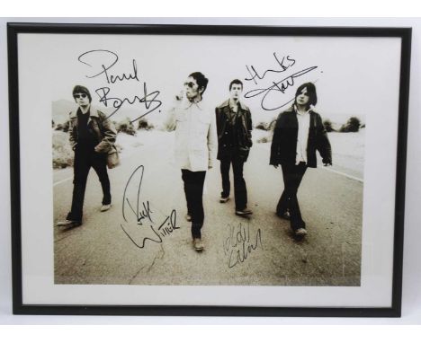 Shed Seven, a large black and white print used on the cover of the 1998 single She Left Me On Friday from the album Let It Ri