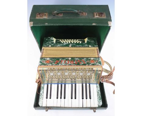 An early 20th century Italian Estrella twenty-four button piano accordion, cased.