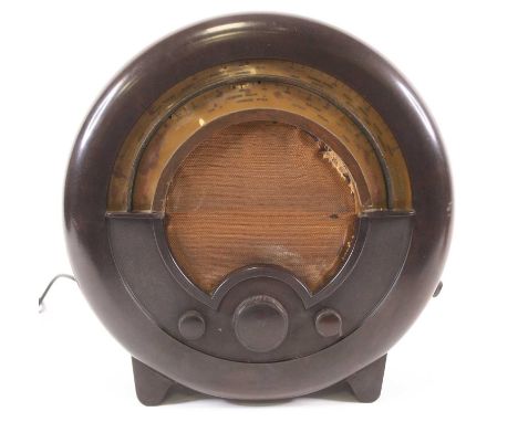 An Ekco Type AD 76 Superhet brown bakelite cased radio, designed by Wells Coates circa 1935, w.40cm.Bakelite bar to the botto