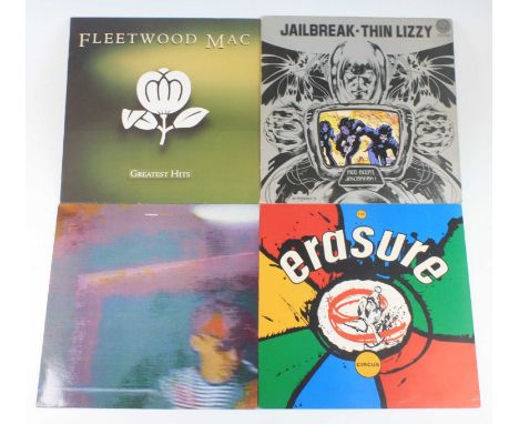 A collection of assorted LPs, various dates and genres, to include Thin Lizzy Jail Break, Black Rose, Johnny The Fox, and Liv