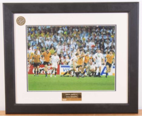 Rubgy Union, Jonny Wilkinson, a 19 x 39cm colour photograph of Wilkinson drop-goal kick in the 2003 World Cup Final, signed i