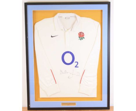 Ruby Union, a replica 2011 season shirt, signed to the chest by Lawrence Dallaglio, mounted for display, 72 x 94cm.