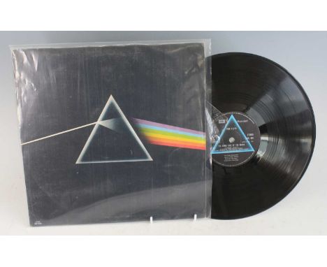 Pink Floyd, Dark Side Of The Moon, Harvest EMI SHVL 804 A - 8 / B - 7, in gate-fold sleeve with two posters (with tape marks 