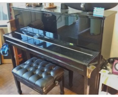 Kemble (c2005)A 116cm Model Classic T upright piano in a bright ebonised case; together with a Roland piano stool in a bright