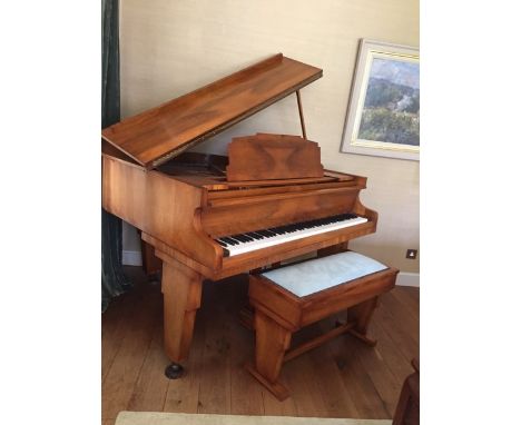 Monington & Weston (c1930's)A 'Masterpiece' Model baby grand piano in a walnut Art Deco style case, raised on inlaid inverted