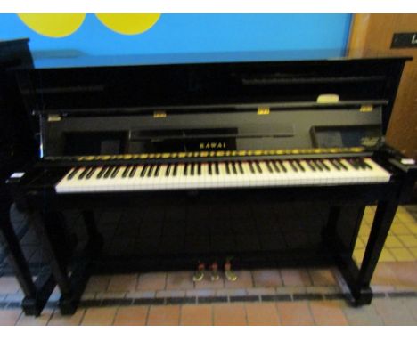 Kawai (c2002)A Model  K-18 ATX upright piano in a bright ebonised case.  AMENDMENT Has a silent system.