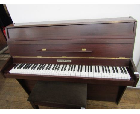 Squire & Longson (c1986)An upright piano in a satin mahogany case; together with a stool with dark green upholstered top.