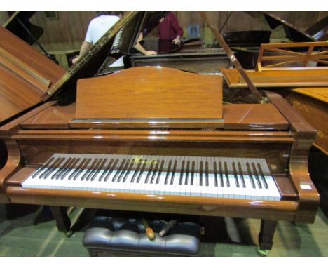 Haessler (c2016)A 5ft 8in Model H-175 grand piano in a  walnut finished case on square tapered legs; together with a stool.