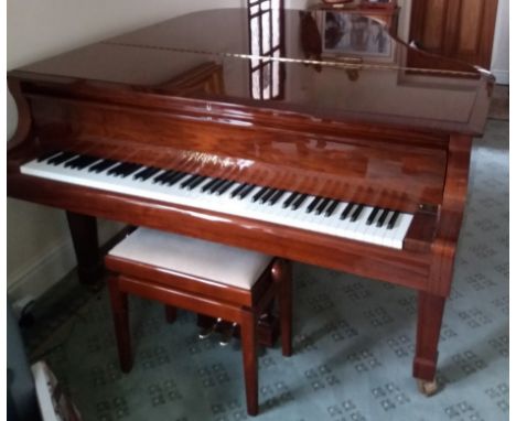 Blüthner (c2010)A 5ft 5in Model 10 grand piano in a bright mahogany case on square tapered legs; together with a matching sto