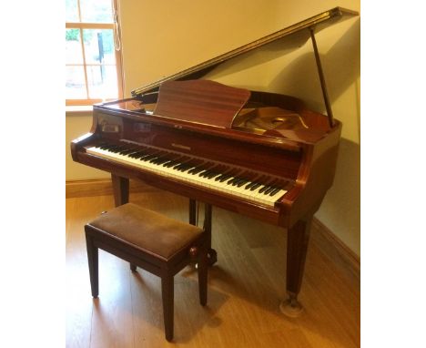 Steinmann (c1979)
A 4ft 6in grand piano in a bright mahogany case on square tapered legs; together with a stool. 