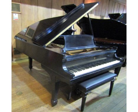 Steinway (c1967)A New York Model B grand piano in a satin ebonised case on square tapered legs; together with a matching duet
