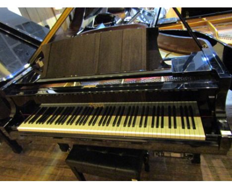 Boston (c1998)A 5ft 10in Model 178 grand piano in a bright ebonised case.  AMENDMENT Is together with an adjustable stool.