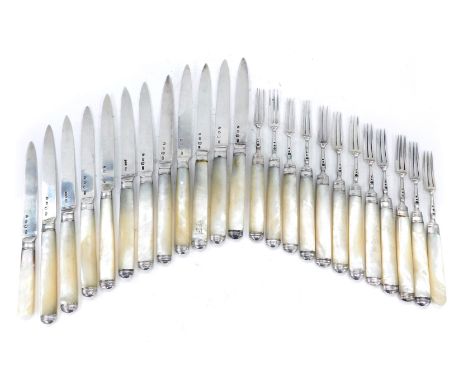 A set of twelve George IV dessert knives and forks, each with a silver blade, and a mother of pearl handle, the handle engrav