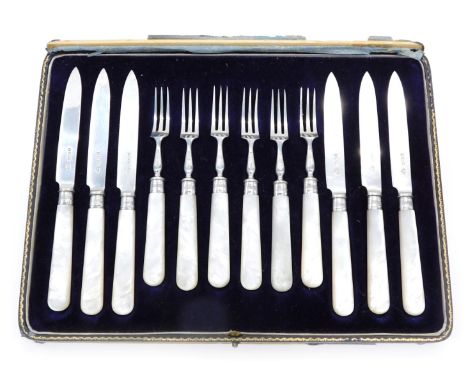 A set of silver and mother of pearl handled fruit eaters, for six persons, cased. (AF)