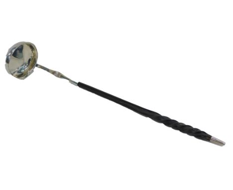 A 19thC silver ladle, with twisted whale bone handle, marks rubbed. 