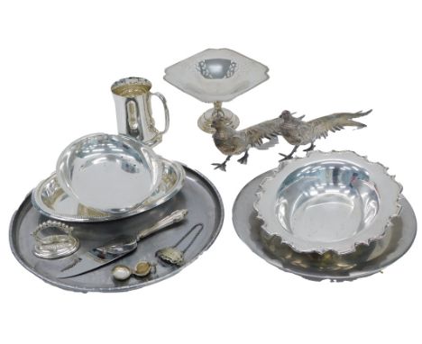 Silver plated wares, comprising large pheasant ornaments, serving trays, plated whisky ladle, plated coin cover, tankard, etc