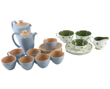 A Poole pottery blue and coral two tone part coffee service, and a Susie Cooper Whispering Grass part service. 