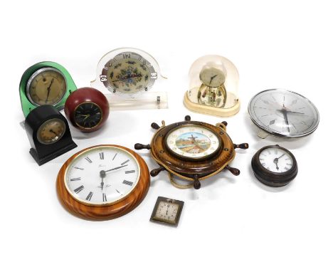 A collection of mantel and wall clocks, to include a dressing table clock in Perspex case, a spherical clock stamped By Europ