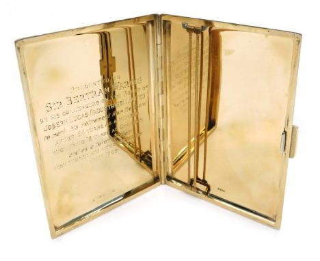 A 9ct gold cigarette case, with engine engraved decoration, engraved to interior Sir Bertram Waring, 156g.