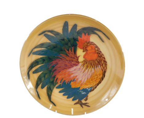 A Dennis China Works studio ceramic bowl, decorated with a cockerel, with tube lined decoration, numbered 23 to underside, im