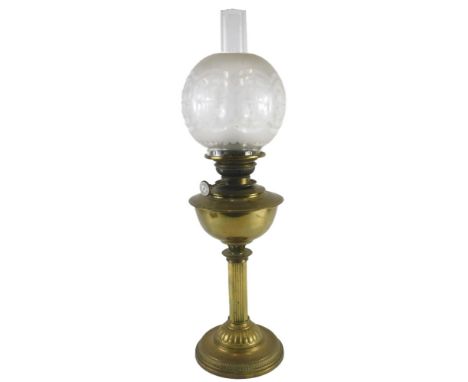 A late 19th/early 20thC oil lamp, with canted reeded column and domed foot, and a partly etched shade decorated with fleur de