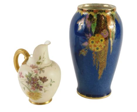 A Royal Worcester blush ivory porcelain jug, decorated with flowers, and a crown Devon lustre vase, decorated in the oriental