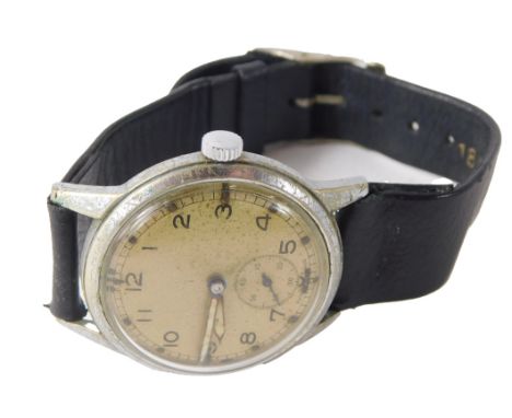 A 1940s APT military issue wristwatch, with a silvered numeric dial, seconds dial and cream markers, in a stainless steel cas