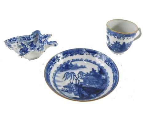A 19thC blue printed leaf shaped pickle dish, unmarked, and a pearl wear blue printed coffee cup and saucer. (3)