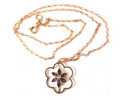 A 9ct gold pendant and chain, the pendant formed as a flower with central stone set flower with amethyst and seed pearl, 2cm 