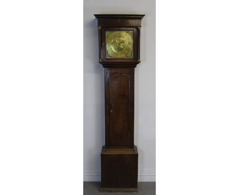 A late 18th/early 19th Century oak longcase clock by Monkhouse of Carlise, the 30cm brass dial with leaf spandrels, chapter r