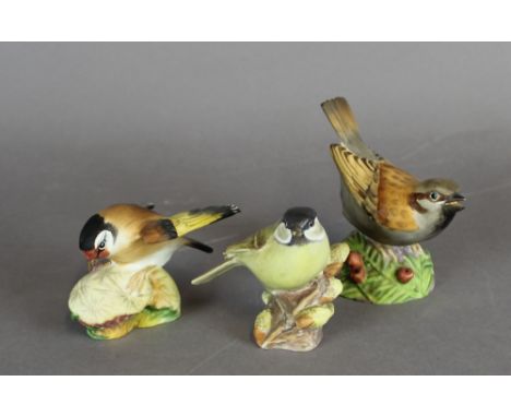 Three Royal Worcester porcelain bird figures - 'Goldfinch', 'Marsh Tit' and 'Sparrow', all modelled by Eva Soper, c. 1965-75 