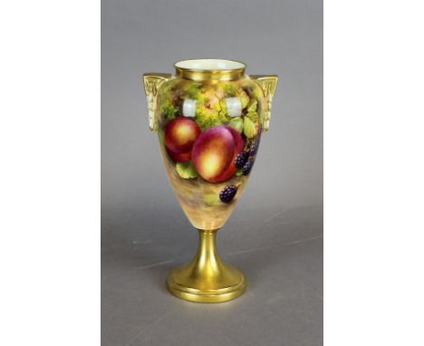 A Royal Worcester porcelain twin handled vase, decorated with fruit by Edward Townsend, 21cm high, signed, purple printed mar