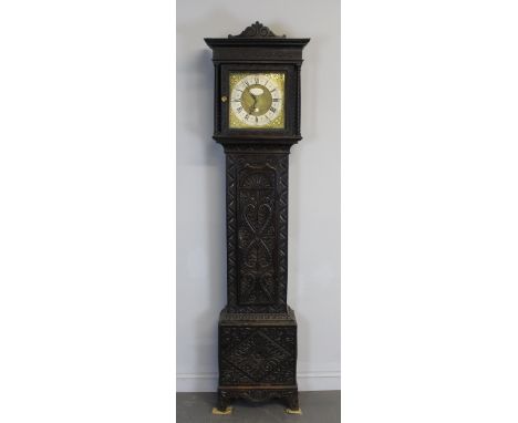 A late 18th/ early 19th Century oak longcase clock by John Porthouse of Penrith, the 29cm brass dial with ornate spandrels, s