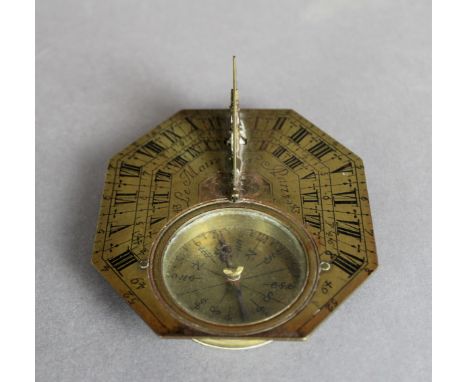 An 18th Century French brass 'Butterfield' type pocket sundial and compass by Le Maire Fils, Paris, 7.2cm x 6.5cm x 3.2cm hig