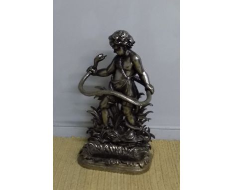 A polished Victorian cast iron stick stand, the back modelled with Herakles defeating the snake, 81.5cm high Good overall con