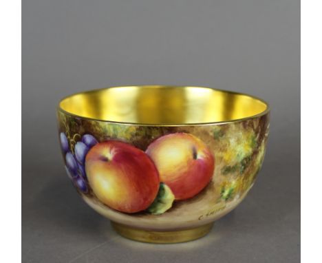 A Royal Worcester porcelain circular bowl, decorated with fruit by Chris Smith, 11cm diameter x 7cm high, signed, black print