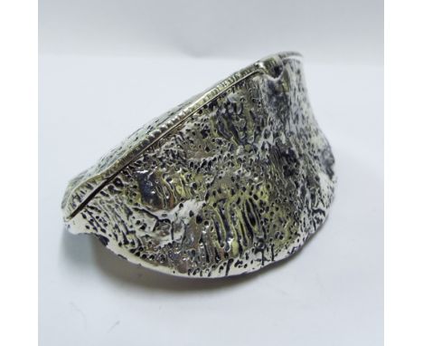 A silver novelty vesta case, in the form of a Brazil nut

We will post this item worldwide at cost. No packing charge. 