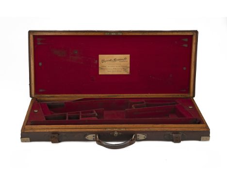 COGSWELL &amp; HARRISON A BRASS-CORNERED OAK AND LEATHER DOUBLE GUNCASE, fitted for 30in. barrels, the interior lined with re