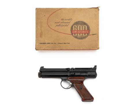 A BOXED .22 CROSMAN MODEL 600 CO2-POWERED REPEATING AIR-PISTOL, serial no. 034680,&nbsp;circa 1965, first variant with 5in. r