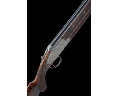 FABRIQUE NATIONALE A CAPECE-ENGRAVED 12-BORE 'CUSTOM' SINGLE-TRIGGER SIDEPLATED OVER AND UNDER EJECTOR, serial no. 57183 S8, 